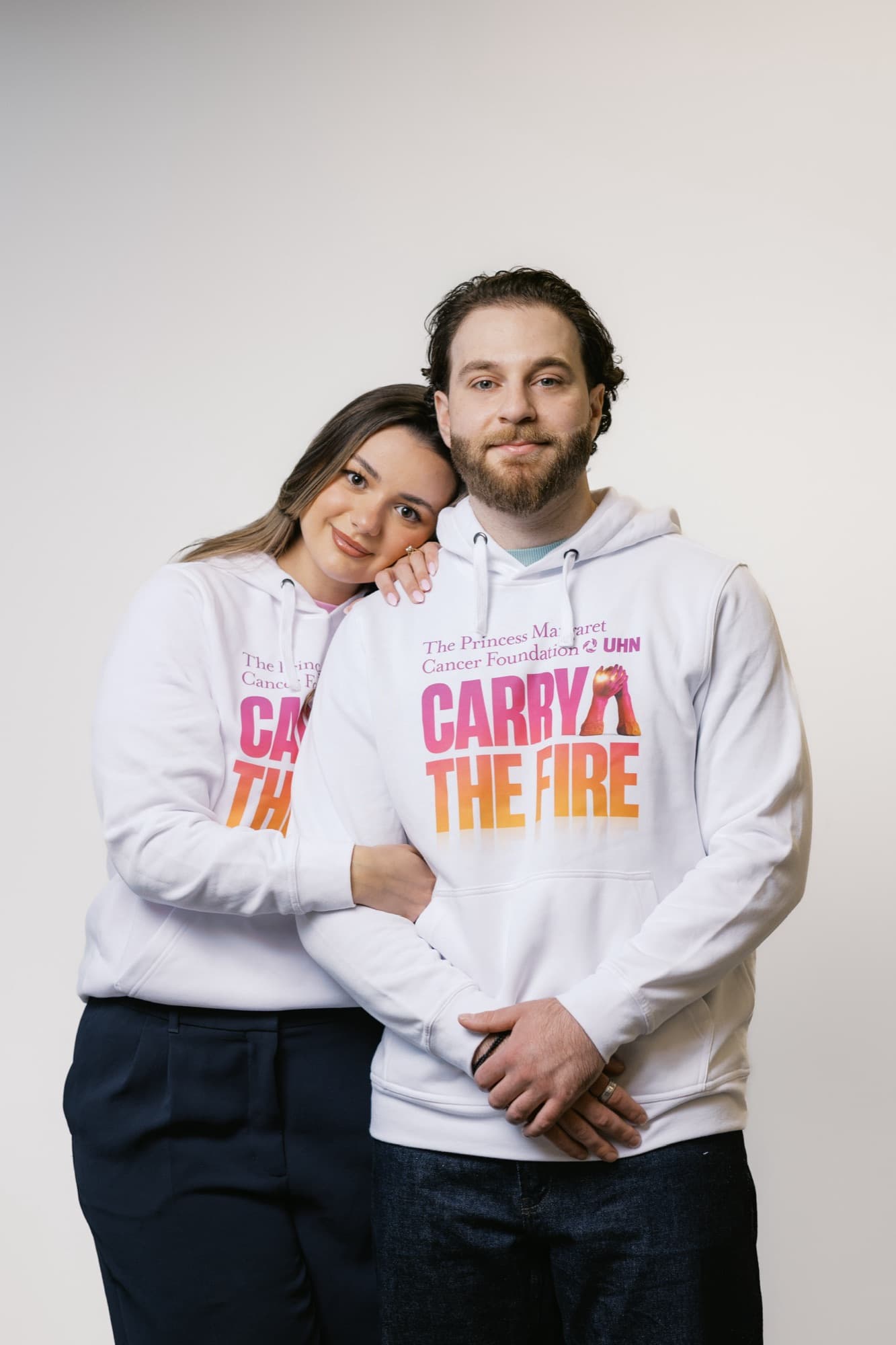 Michael Argyrides and Amalia Kontolemos in Carry the Fire hoodies